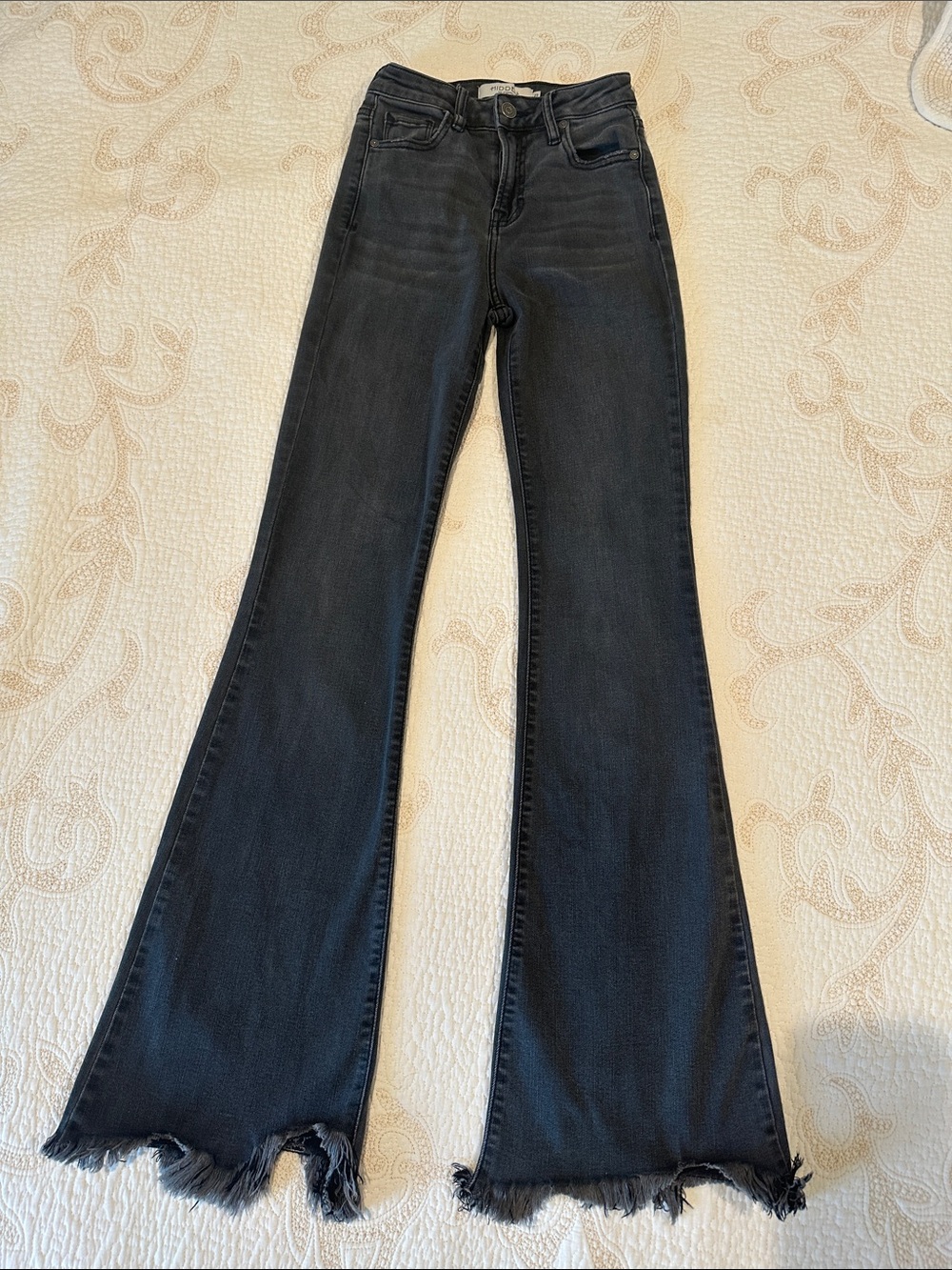 High-Rise Black Flare Jeans with Raw Hem